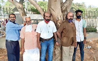 Environment activists protetsing the felling of trees near the High Court.