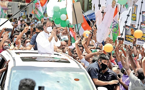 Rahul Gandhi, MP, greets people during his visit to Manarcaud in Kottayam on Tuesday while campaigning for Oommen Chandy, who is contesting from Puthuppally | vishnu Prathap