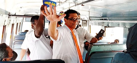 UDF candidate MP Joseph seeking votes at Bheemanady bus stop in West Eleri panchayat in Trikaripur constituency on Wednesday. (Photo | EPS)