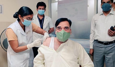 Delhi minister Gopal Rai gets vaccinated. (Photo | Gopal Rai Twitter)