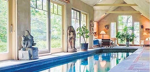 Koshta murthis adorning an indoor swimming pool in an advertisement for a  collection that was put up for sale by an auction house | India Pride Project volunteers