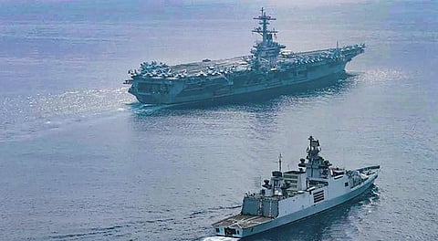 INS Shivalik participates in a Passage Exercise (PASSEX) with US Navy's USS Theodore Rosevelt Carrier Strike Group in the eastern Indian Ocean Region. (Photo | PTI)