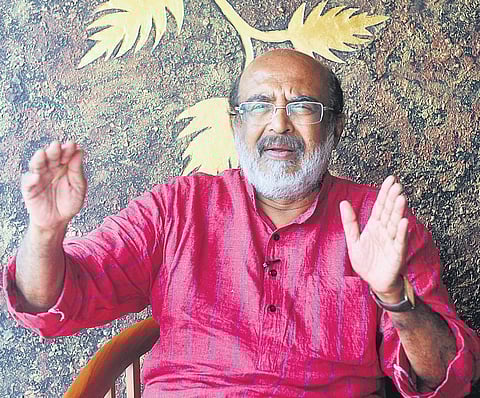 Finance Minister TM Thomas Isaac,