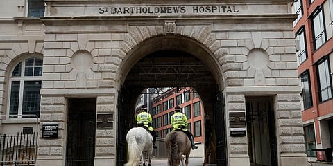 Police horses walk through an archway entrance to St Bartholomew's Hospital in London, where Britain's Prince Philip is being treated, Tuesday, March 2, 2021. (Photo | AP)