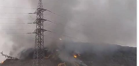 A section of the landfill site had caught fire on Sunday evening, worsening pollution levels in the area. (Video Screengrab)