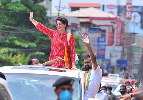 Congress leader Priyanka Gandhi during a roadshow to campaign for UDF candidate Saneeshkumar Joseph at Chalakudy on Wednesday. (Photo | A Sanesh, EPS)