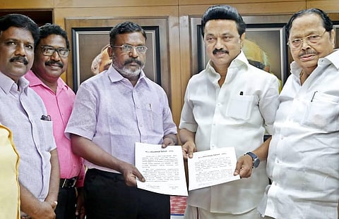 VCK president Thol Thirumavalavan and DMK president MK Stalin inked a poll pact with six seats at DMK headquarters. (Photo | EPS)