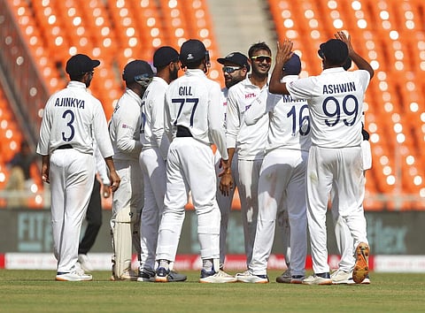 India's Axar Patel, third right, celebrates with teammates the dismissal of England's Dominic Bess during the third day of fourth test match at Narendra Modi Stadium in Ahmedabad. (Photo | AP)