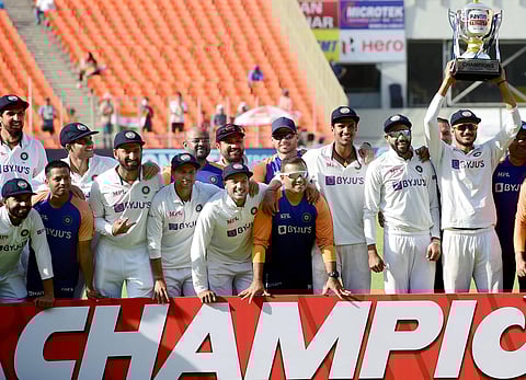 Indian cricket team players hold the torphy after defeating England in the 4th test match of the series at Narendra Modi Stadium in Ahmedabad, Saturday, March 6, 2021. (Photo | PTI)