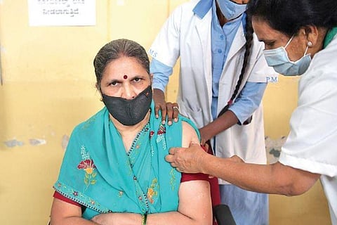 A woman gets the Covid vaccine as part of the third phase of the vaccination drive at KC General Hospital, in Bengaluru on Saturday | Meghana Sastry