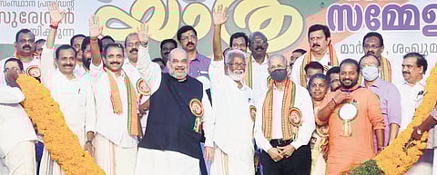 Union Home Minister Amit Shah with BJP state president K Surendran at the valedictory function of the ‘Vijaya Yatra’ at Shankhumukham beach in Thiruvananthapuram on Sunday.