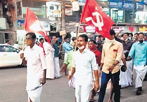 CPM supporters hold a protest rally in Kuttiady on Monday