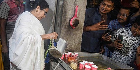 West Bengal CM Mamata Banerjee pours tea at a stall, during an election campaign ahead of state assembly polls, in Nandigram, Tuesday, March 9, 2021. (Photo | PTI)