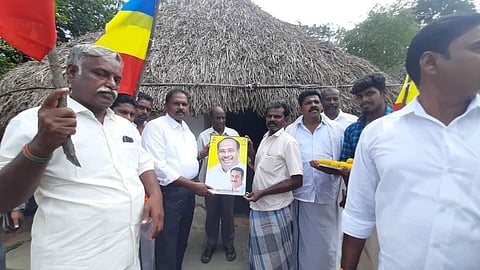 PMK cadres with photos of party leaders. (Photo| EPS)