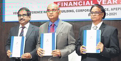 APERC Chairman CV Nagarjuna Reddy and members P Raja Gopal Reddy and Thakur Ram Singh release the new tariff order in Vizag on Wednesday | express