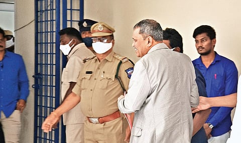 Police showing the way to Nimmagadda Ramesh Kumar after the press conference on the last day as SEC in Vijayawada on Wednesday I P Ravindra Babu