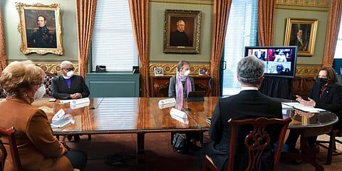 Vice President Kamala Harris, right, meets with faith leaders. (Photo | AP)