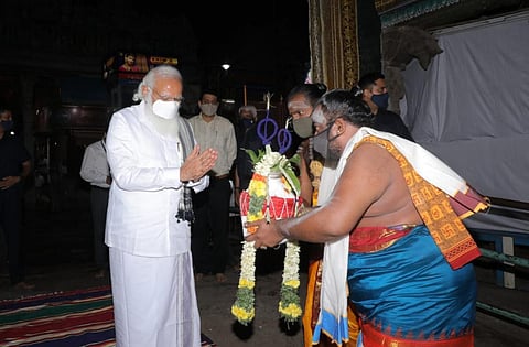 PM Modi reached the temple a wearing a dhoti and shirt. (Photo | EPS)