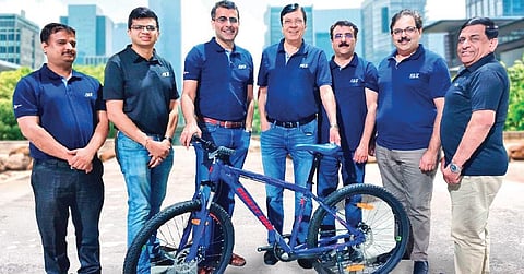 Sachin and Vishal Chopra with their team