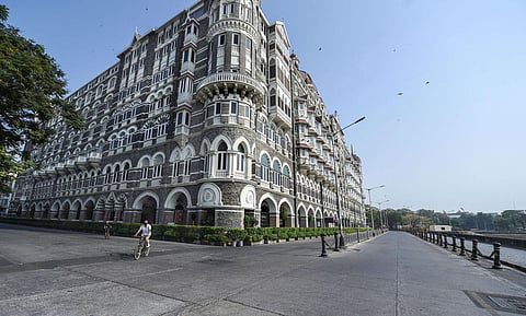 A deserted view of Mumbai's Taj Hotel Gateway as Maharashtra Government announced a weekend lockdown due to a surge in COVID-19 cases. (Photo | PTI)