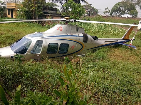 A private copter belonging to Lulu Group crash landed on a marshy land at Panangad on Sunday morning. (Photo: A Sanesh)
