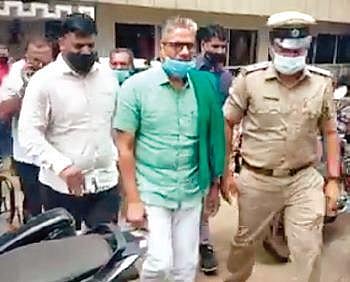Police personnel take farmer leader Kodihalli Chandrashekhar into custody in Belagavi on Saturday | Express