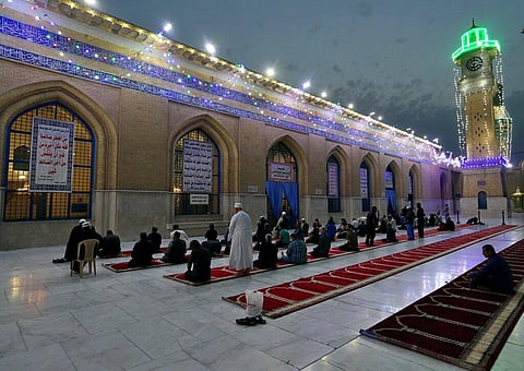 Muslims perform evening prayer at the Sunni shrine of Abdul-Qadir al-Gailani, ahead of the upcoming Muslim fasting month of Ramadan, in Baghdad, Iraq. (FIle Photo | AP)