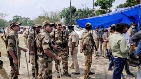 Security personnel keep vigil at a polling station in Sitalkuchi assembly seat in West Bengal's Cooch Behar district. (Photo | PTI)