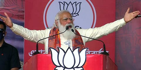 Prime Minister Narendra Modi addresses during an election public rally in Bardhaman. (Photo | ANI)