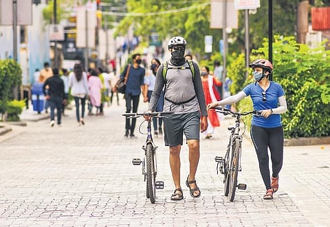 Bengalureans taking a stroll down Church Street during weekends after traffic was banned in the area