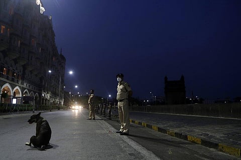 Security personnel guard near Gateway of India monument in Mumbai. (Photo | AP)