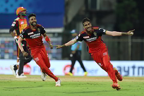 Shahbaz Ahmed of Royal Challengers Bangalore celebrates the wicket of Abdul Samad. (Photo | PTI)