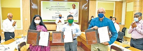 The MoUs being signed in presence of Chief Minister Naveen Patnaik | Express