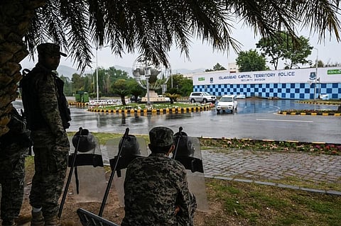 Paramilitary soldiers stand guard in front of the French Embassy in Islamabad to beef up security following violent protests. (Photo | AFP)