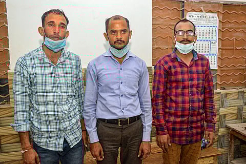 Three persons who were arrested by the police for alleged black marketing of COVID-19 vaccines, in Kanpur, Thursday. (Photo | PTI)