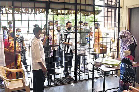 People wait at a Primary Health Centre in Secunderabad to receive the vaccine, on Friday | S Senbagapandiyan