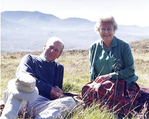 A  personal photograph of Queen Elizabeth II and Prince Philip Duke of Edinburgh at the top of the Coyles of Muick, Scotland in 2003. (File Photo | AP)