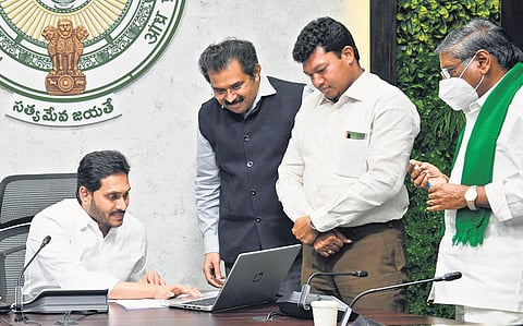 Chief Minister YSJagan Mohan Reddy launches milk collection in Guntur district under AP Amul project at his  camp office in Tadepalli on Friday I Express