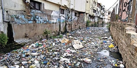 With less than two months left for monsoon arrival, heaps of waste material dumped in a drain at Nallagutta is yet to cleared (Photo | S Senbagapandiyan, EPS)