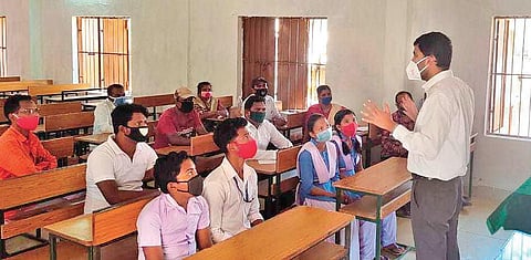 Koraput Collector interacting with various stakeholders at a school | Express