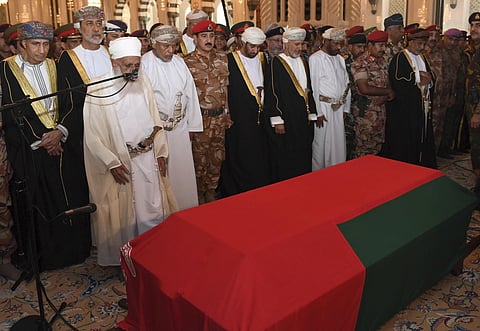 Oman's new sultan Haitham bin Tariq Al Said, second from left of second row, attends the prayer ceremony for Sultan Qaboos' coffin at Sultan Qaboos Grand Mosque in Muscat, Oman. (Photo | AP)