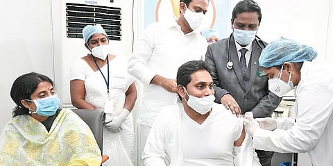 Chief Minister YS Jagan Mohan Reddy takes Covid vaccine at the ward secretariat in Guntur on Thursday | Express