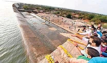 MAUD Minister KT Rama Rao watches as Godavari waters reach Upper Manair through Kudavelli Vagu at Rajanna Siricilla district, on Monday.