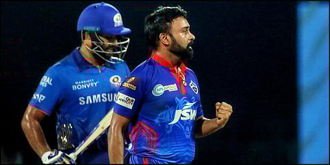 Delhi Capitals' Amit Mishra celebrates the wicket of Mumbai Indians skipper Rohit Sharma during an IPL 2021 match in Chennai. (Photo| ANI)