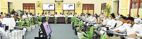 Minister R Ashok , K Gopalaiah and Dr K Sudhakar arrive for the all-party meeting on Monday at the Vidhana Soudah on Monday | Express