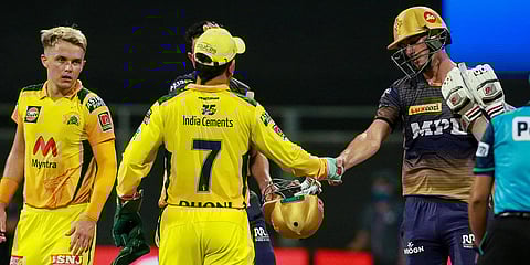 Kolkata Knight Riders' Pat Cummins congratulates Chennai Super Kings players after the latters' win in an IPL 2021 match in Mumbai. (Photo| Twitter/@KKRiders)