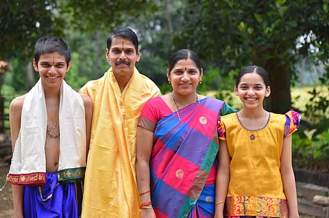 Aniruddha, who will be the next Shiroor Mutt pontiff, seen with his parents and sister. (Photo | EPS)