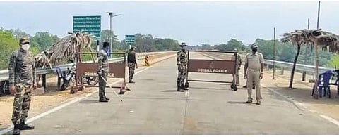 Police personnel guarding the border check post at Motu  |Express