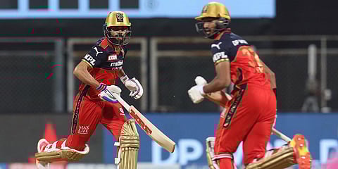 Virat Kohli and Devdutt Padikkal of Royal Challengers Bangalore take a run in an IPL 2021 match against Rajasthan Royals. (Photo| ANI)