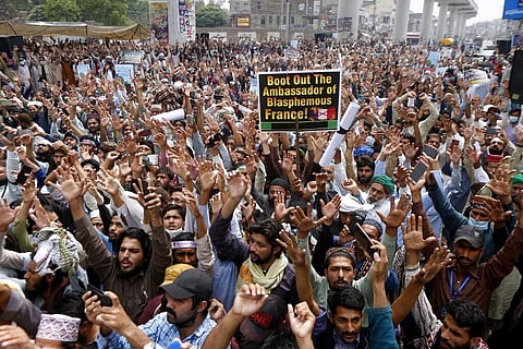 Supporters of Tehreek-e-Labiak Pakistan, a banned Islamist party, protest the arrest of their party leader Saad Rizvi, in Lahore, Pakistan. (Photo | AP)